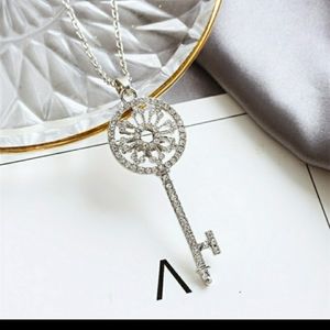 Silver Key Pendant Necklace